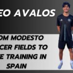 Leo Avalos, a young soccer player, standing confidently in a black soccer jersey, with the text 'From Modesto Soccer Fields to Elite Training in Spain' and the Modesto Cruizers logo displayed on a sleek black and gray background.